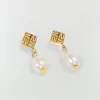 DONNA oorbellen met logo - antique gold